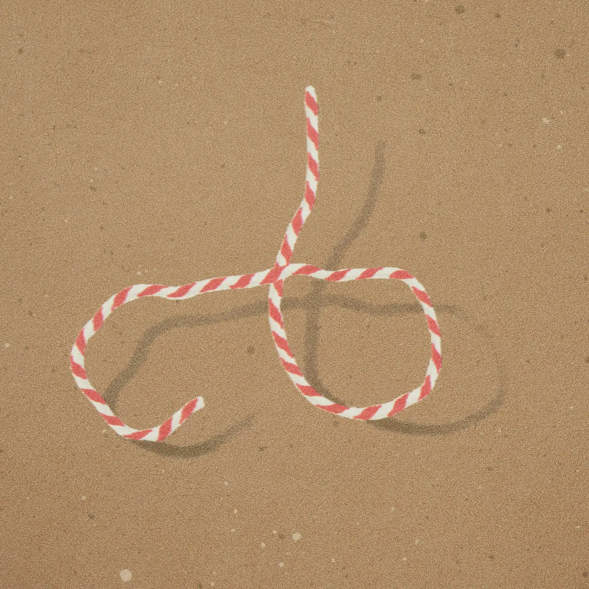 BUTCHER STRING_ RED AND WHITE ON BROWN